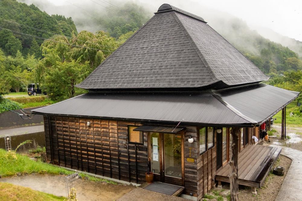 Renovated old traditional house has check-in counter and dining room.